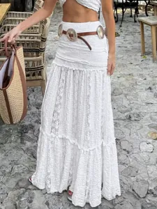 French bohemian white lace maxi skirt with elegant A-line silhouette and textured fabric.