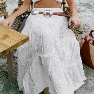 Elegant bohemian white lace maxi skirt with A-line silhouette and floor-length design