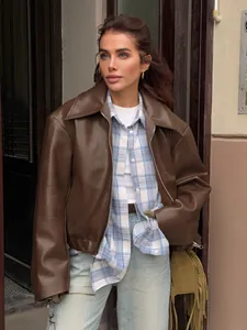 Stylish vintage brown matte faux leather motorcycle jacket for women in street style