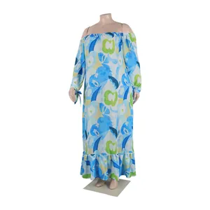 Detail view of floral print off-shoulder maxi dress with tiered ruffle hem and tie cuffs