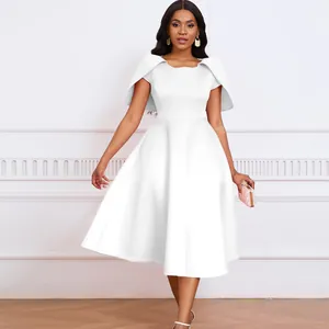 Elegant white formal dress featuring unique cloak-style sleeves and a flared midi skirt