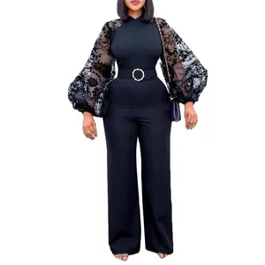 Elegant black jumpsuit featuring mesh floral lantern sleeves and matching belt detail