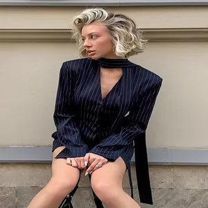 Elegant navy blue pinstripe halter neck blazer and mini skirt two-piece set for women