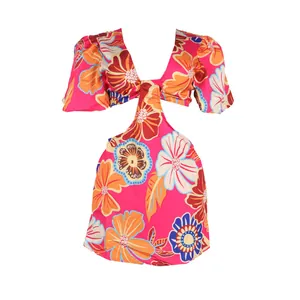 Vibrant floral cut-out romper dress with ruffle sleeves and vivid multicolored summer prints