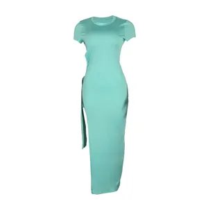Macro view showing the side slit and cutout tie details on a mint green bodycon dress