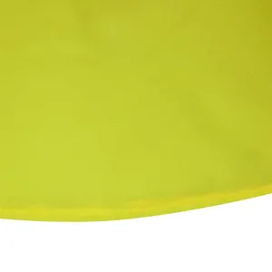Macro detail of neon yellow chiffon fabric showing the hem and lightweight texture