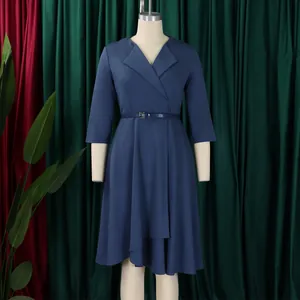 Professional detail of a blue V-neck midi dress with belt on a display mannequin