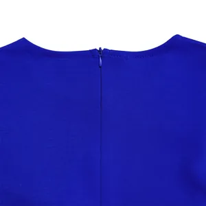 Detail shot of the back invisible zipper and fabric texture of a royal blue dress