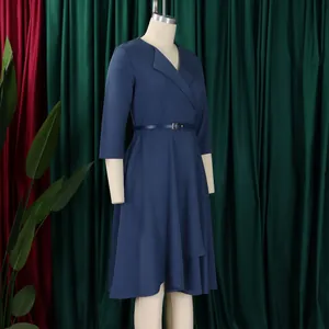 Elegant navy blue midi dress with V-neckline, slim waist belt and flared skirt.