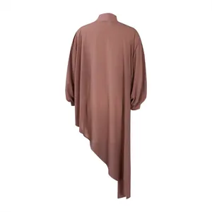 Back view detail of loose chiffon dress with an asymmetrical hem in mauve