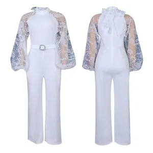 Front and back view of elegant white wide-leg jumpsuit with mesh lantern sleeves and belt