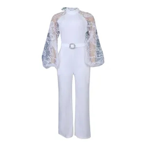 Elegant white jumpsuit featuring intricate lace lantern sleeves and a silver buckle belt