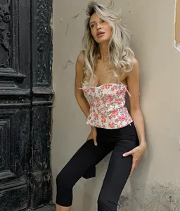 Model showcasing the tight fit and hip-lifting effect of black high-waisted yoga leggings