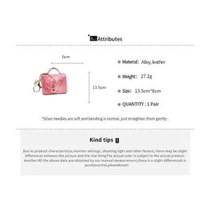 Specifiche dettagliate per mini ciondolo portachiavi in pelle floreale rosa e borsa