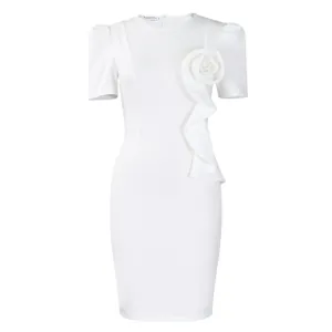 Elegant white bodycon dress featuring puff sleeves and a large fabric flower accent.