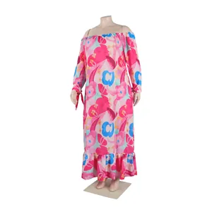 A detailed view of a pink floral off-the-shoulder long maxi dress displayed on a mannequin