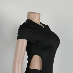 Side view detail of a black sexy hollow-out stretch tight midi dress two-piece set