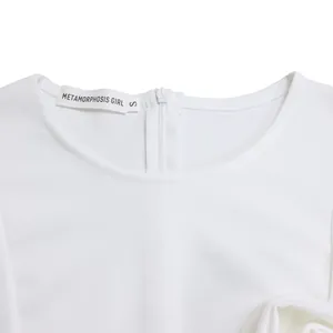 Detail shot of the neckline and zipper on a white elegant short sleeve dress
