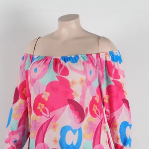 Detailed close-up of vibrant floral print on an off-the-shoulder slim-fit dress