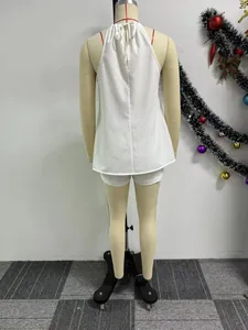 Back view of white sexy halter neck sleeveless top and matching shorts set on mannequin