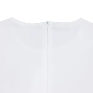 Close-up detail of the back hidden zipper and circular neckline of a white elegant dress