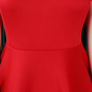 Detailed close-up showing the waistline and fine red fabric texture of the party dress