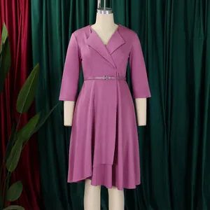 Elegant purple V-neck high waist dress with flared hem and matching belt detail view