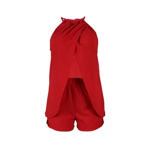 Sexy red halter neck sleeveless two-piece set featuring front slit top and matching shorts