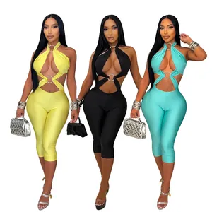 Tuta sexy con scollo all'americana e ritagli in giallo nero e turchese per donne
