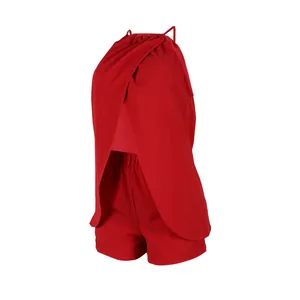 Detail of red sexy halter neck sleeveless split top and matching shorts two-piece set