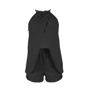 Detail view of black solid color halter neck sleeveless top and shorts set