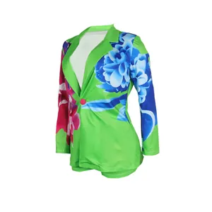 Stylish women's green blazer and shorts set with vibrant blue floral print patterns