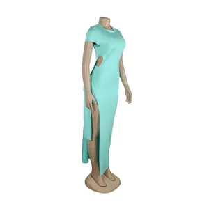 Side view of mint green bodycon two-piece set featuring cut-out top and high slit skirt