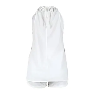 Back view of white halter neck top and matching shorts set with tie-up detail
