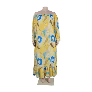 Detailed macro view of yellow floral off-the-shoulder maxi dress with elegant ruffles