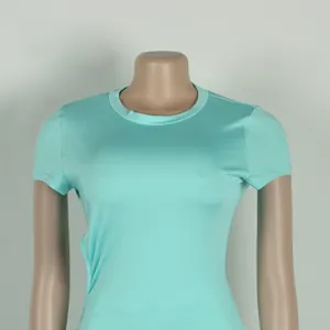Close-up view of the turquoise slim fit crew neck top for a two-piece skirt set