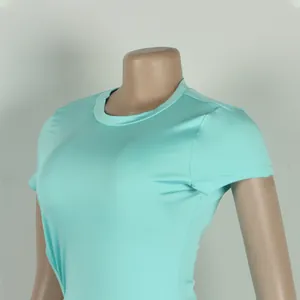 Close-up detail of a light blue tight-fitting crew neck short sleeve stretch t-shirt