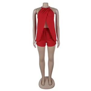 Red solid color halter neck sleeveless top and shorts two-piece set on mannequin