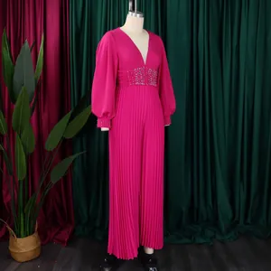 Elegant fuchsia pleated wide-leg jumpsuit with pearl beaded waist and lantern sleeves