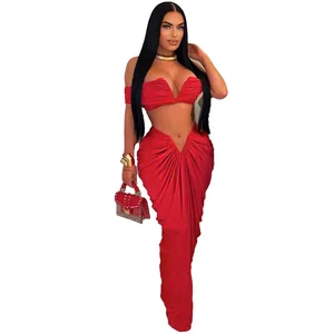 Sexy red two-piece outfit featuring a strapless bandeau top and a pleated maxi floor skirt