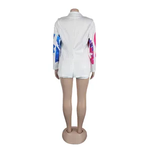 Back view of white long sleeve blazer set with colorful floral print on sleeves
