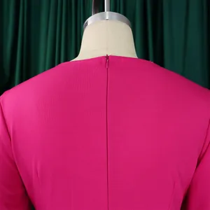 Detail view of the high-quality hidden back zipper on a elegant magenta fashion jumpsuit