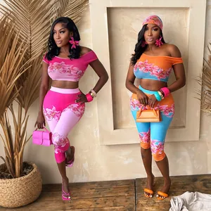 Floral print drop-shoulder crop top and high-waist leggings two-piece set for women.