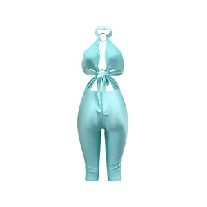Tuta sexy turchese con scollo all'americana e schiena scoperta da donna