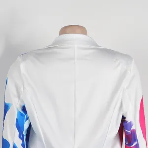 Detailed back view of a white blazer featuring vibrant blue and pink abstract prints.