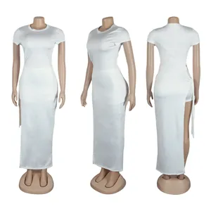 Detailed view of sexy white two-piece skirt set with high slit and side tie design