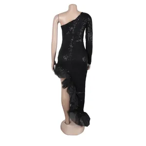 Back view of a black sequined one-shoulder dress with asymmetrical mesh ruffles