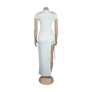 Back view of a white sexy slim-fit two-piece midi dress with a high slit and tie detail