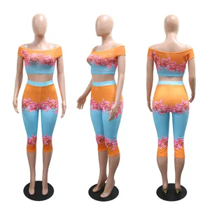 Three-angle view of floral print off-shoulder crop top and high-waisted pants set