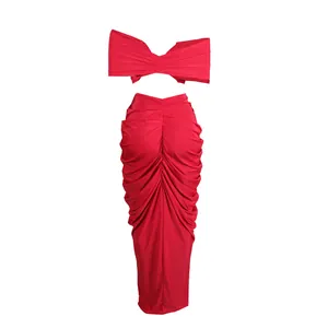 Elegant red two-piece set with a sexy ruched maxi skirt and bandeau bow crop top.
